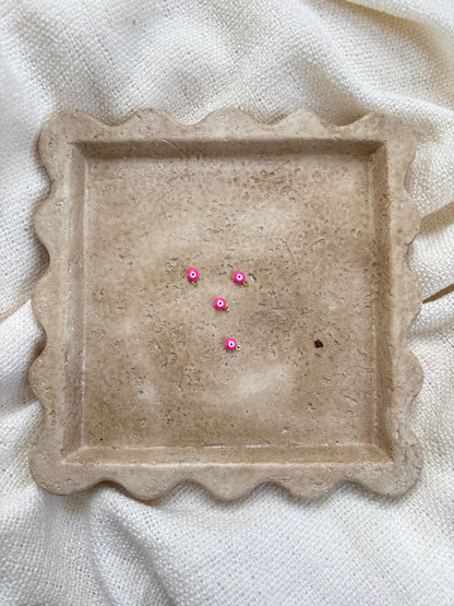 Pendentif œil rose