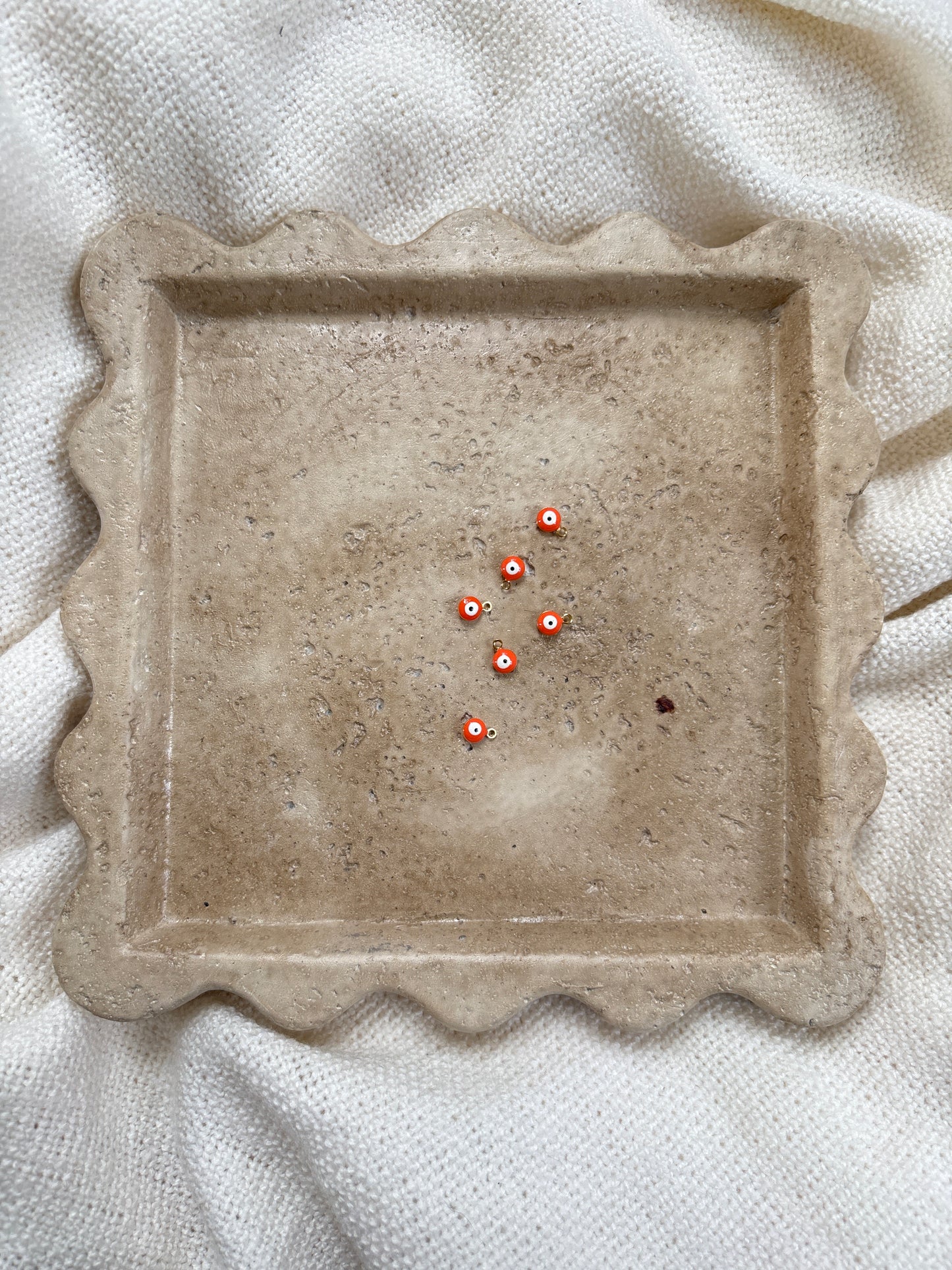 Pendentif œil orange