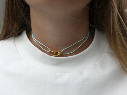 collier cordon menotte